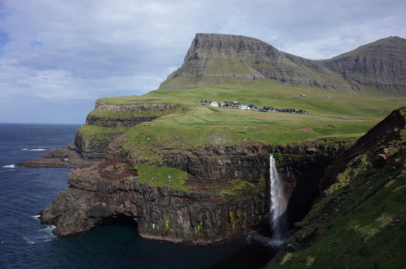 Overview of Gásadalur, with a view of the waterfall