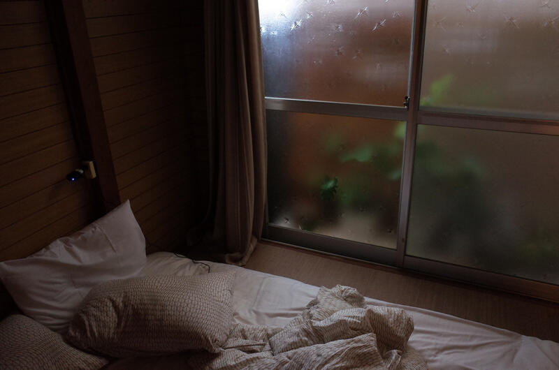 An unmaid bed at a Kyoto machiya